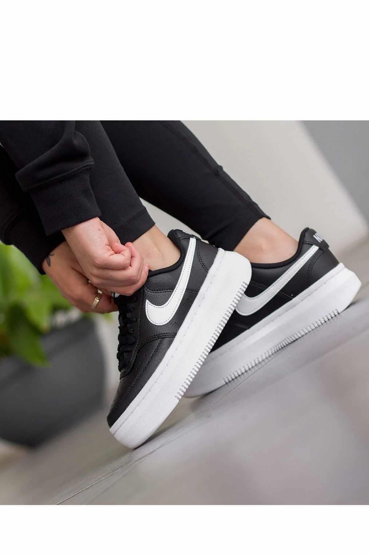 Black nike top flat shoes