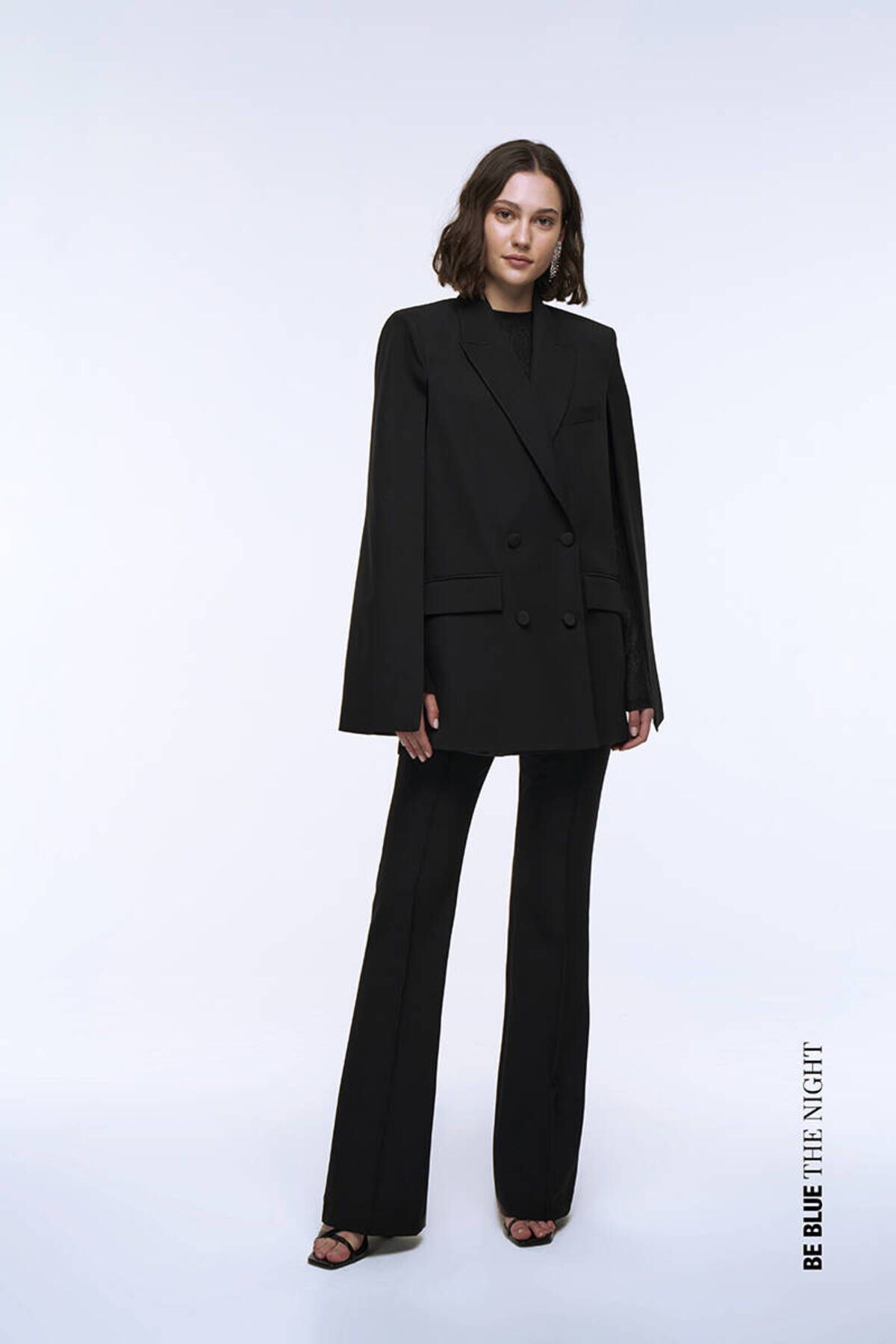 Cape blazer black top