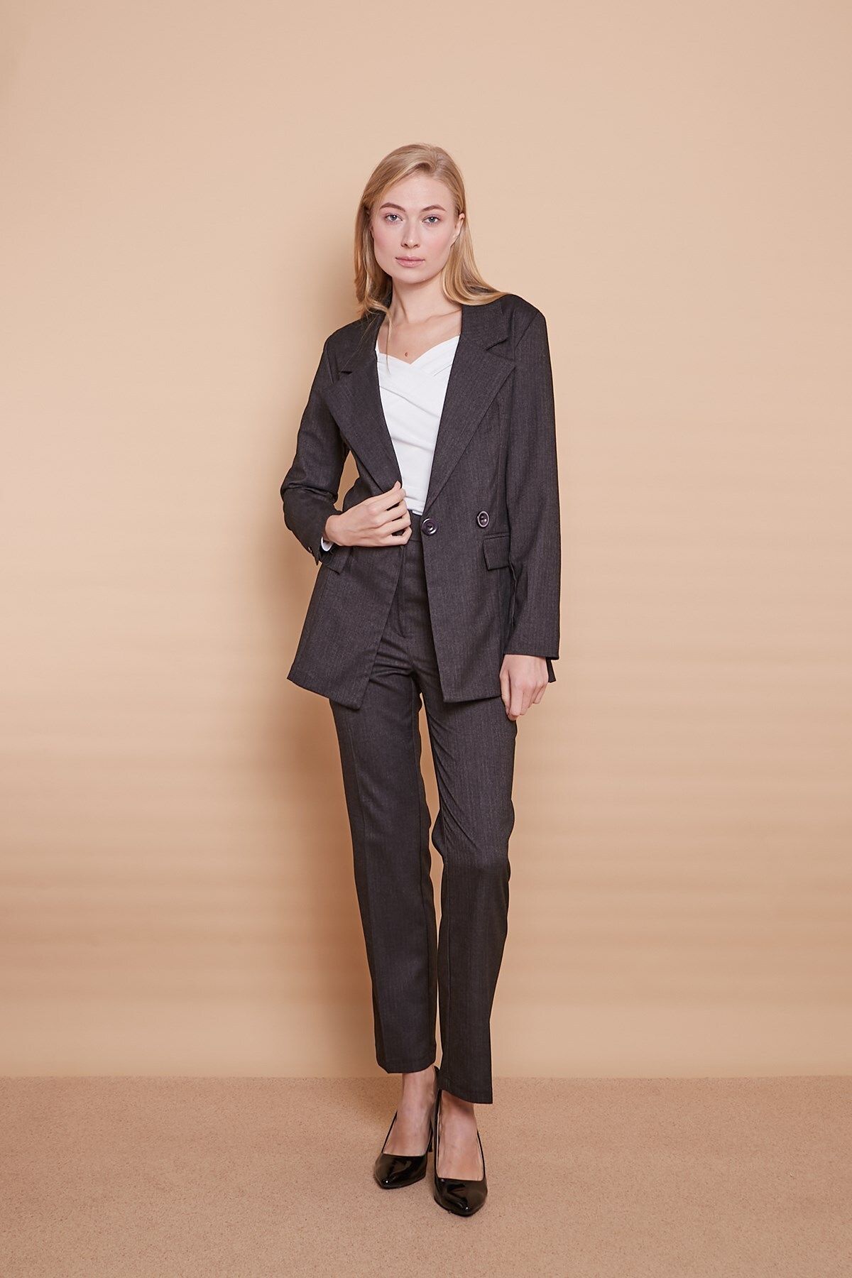 Blazer with top cut sleeves