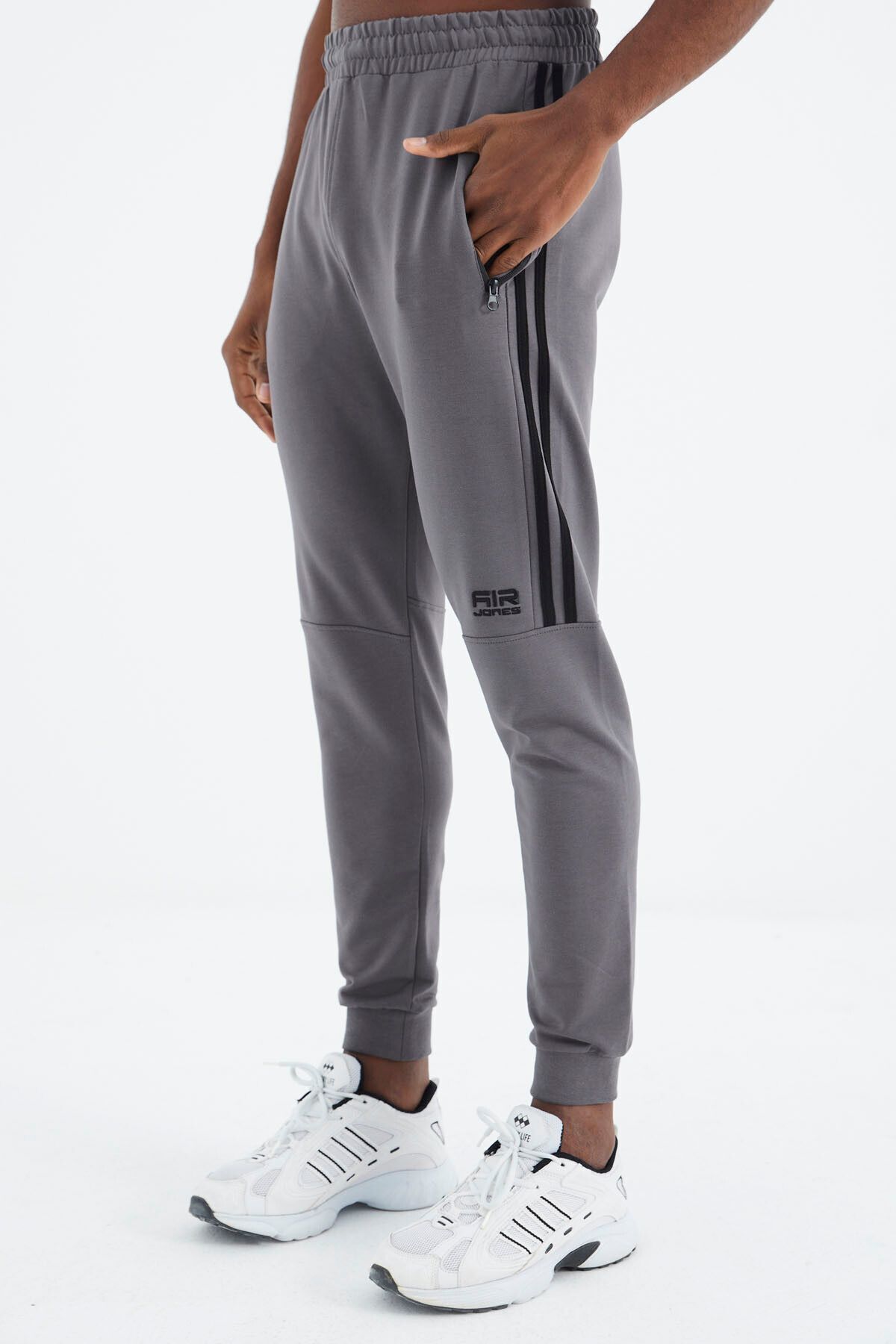 Dark grey hotsell nike tracksuit bottoms