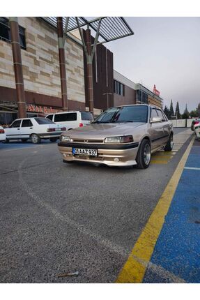 Mazda 323 Sedan Ön Tampon Eki Boyasız Siyah Image 0
