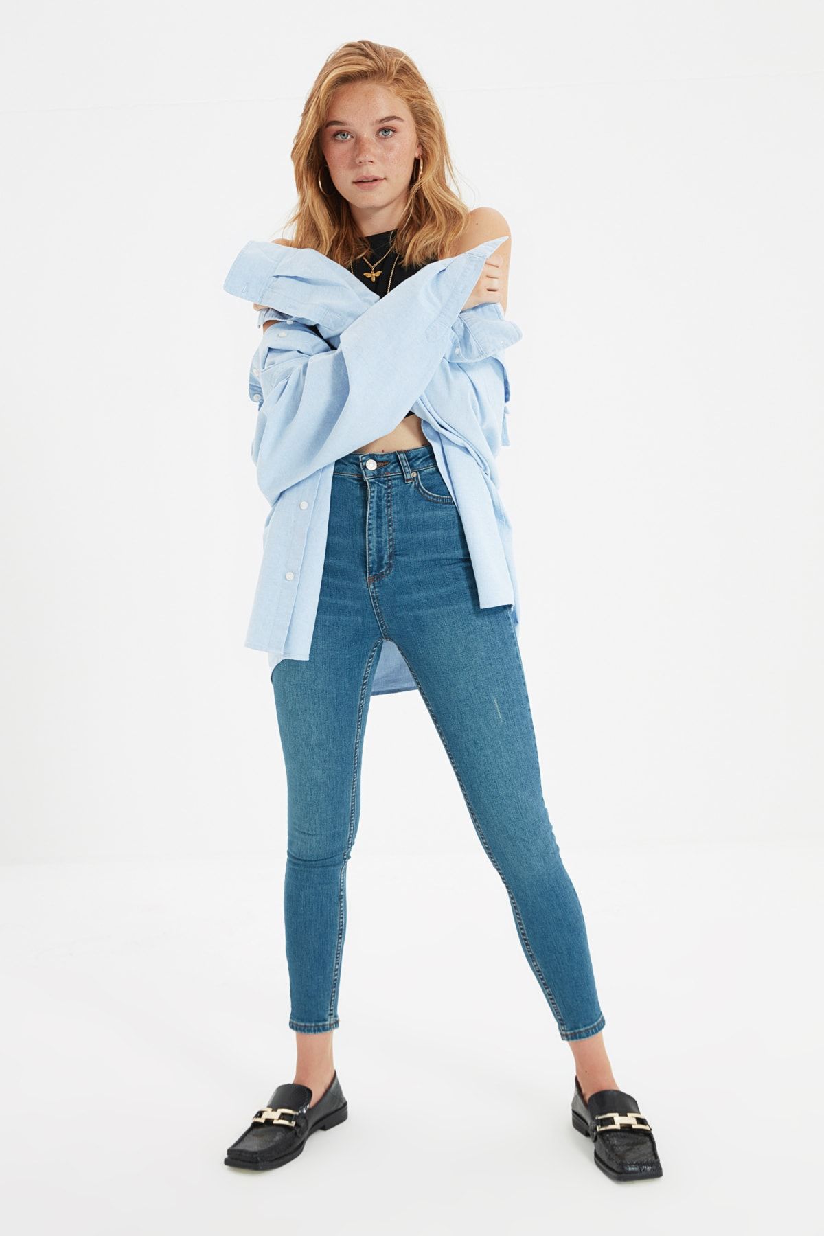 TRENDYOLMİLLA Mavi Yıpratmalı Yüksek Bel Skinny Jeans TWOAW21JE0517