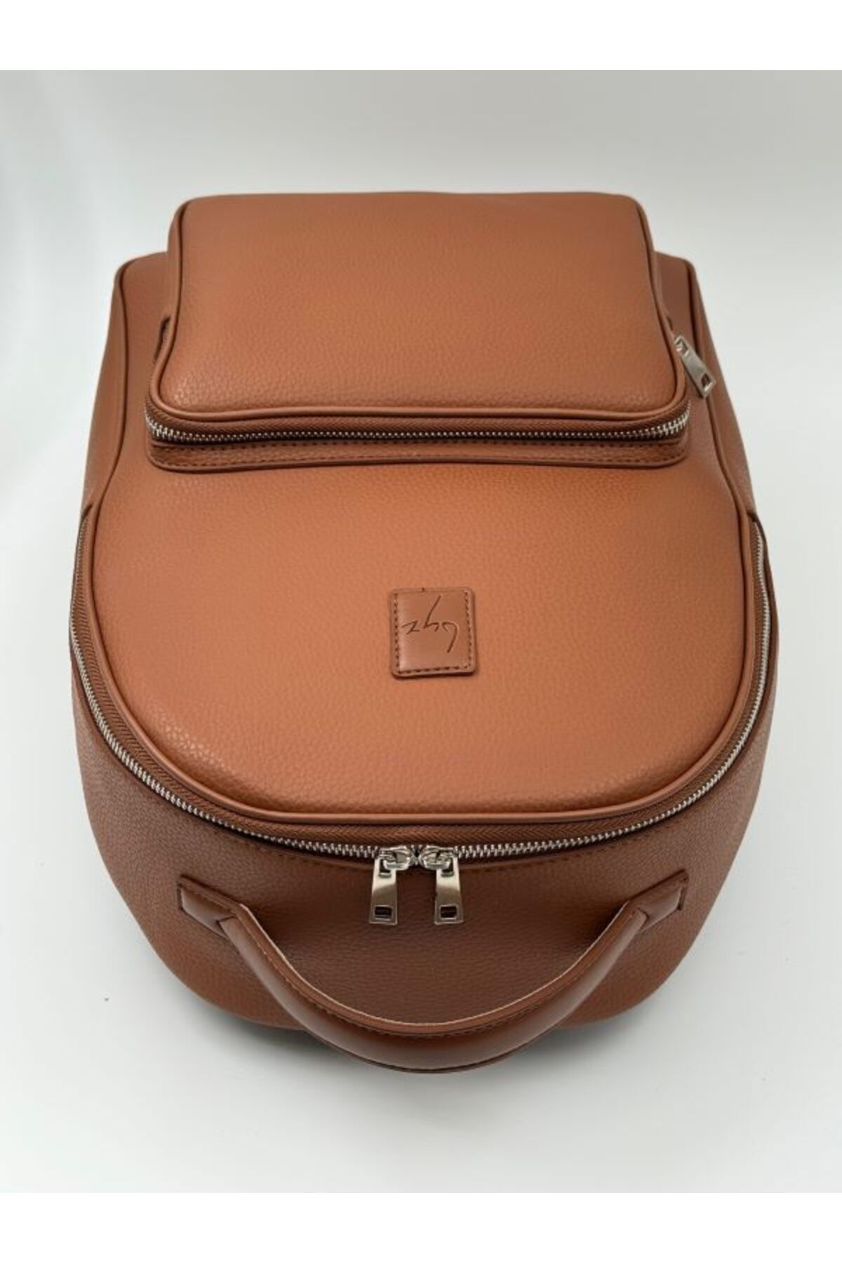 -252 Sırt Çantası Taba Backpack Handcrafted Using Quality Materials And Accessories.