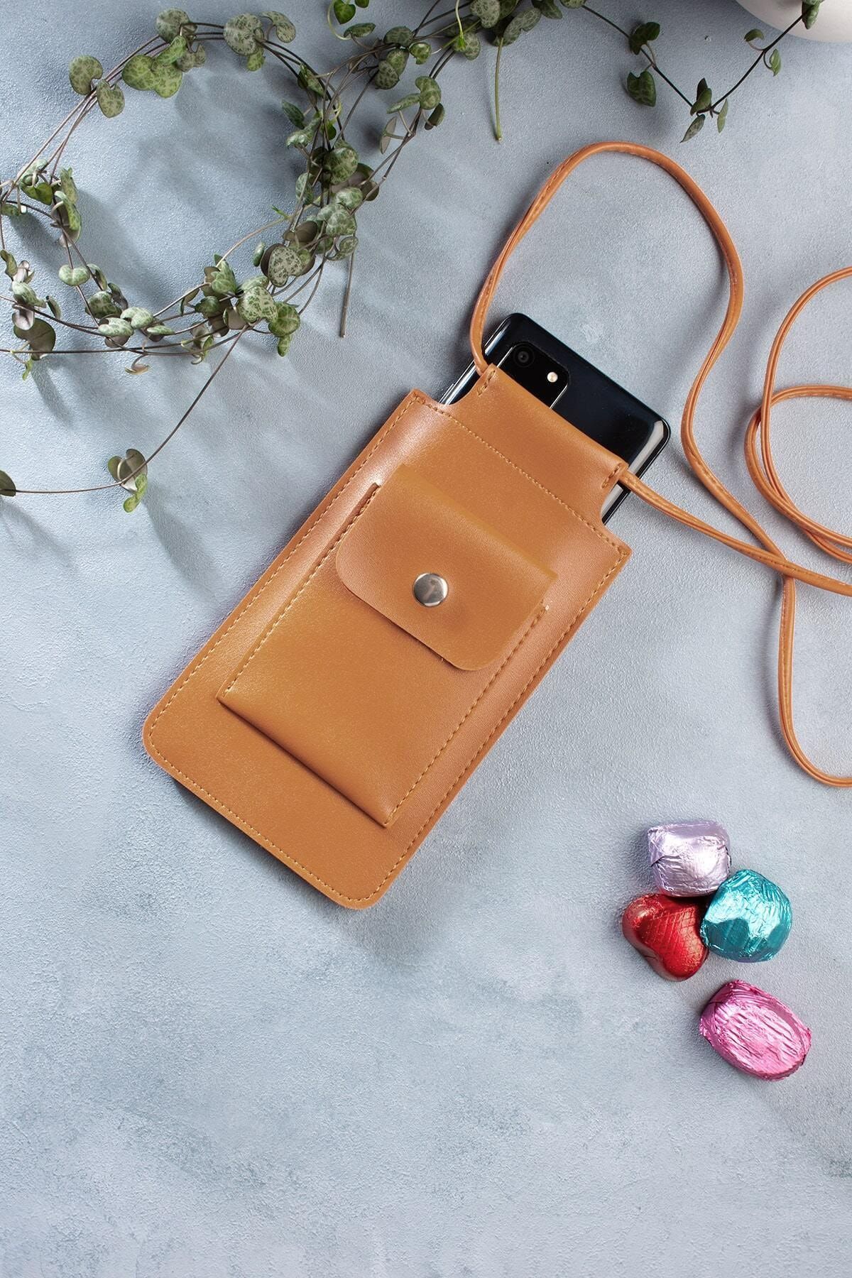 Phone purse outlet with strap