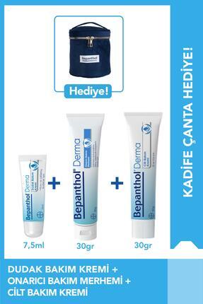 Cilt Bakım Kremi 30g + Onarıcı Merhem 30g + Dudak Kremi 7.5ml + Kadife Çanta Image 0