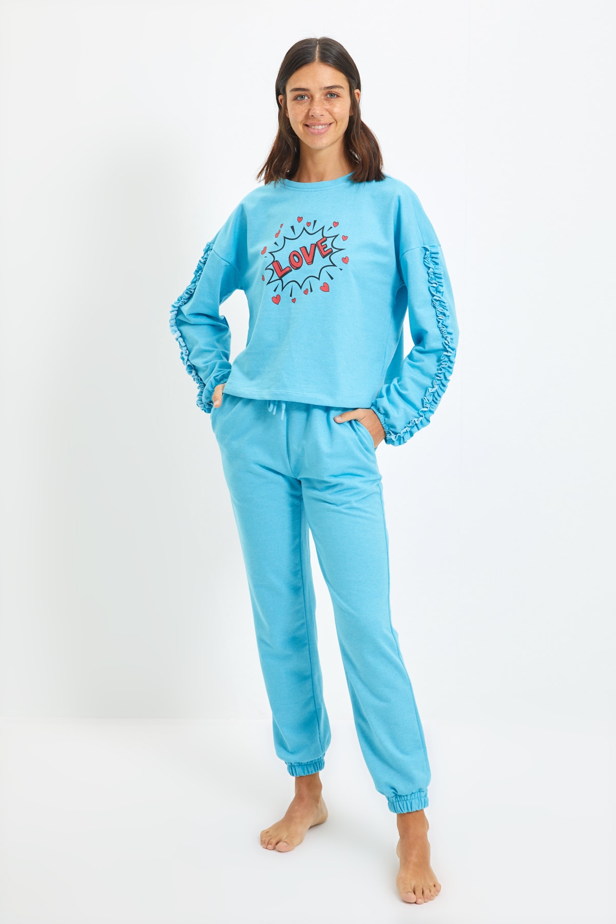 TRENDYOLMİLLA Mavi Fırfır Detaylı Baskılı Örme Pijama Takımı THMAW22PT0243