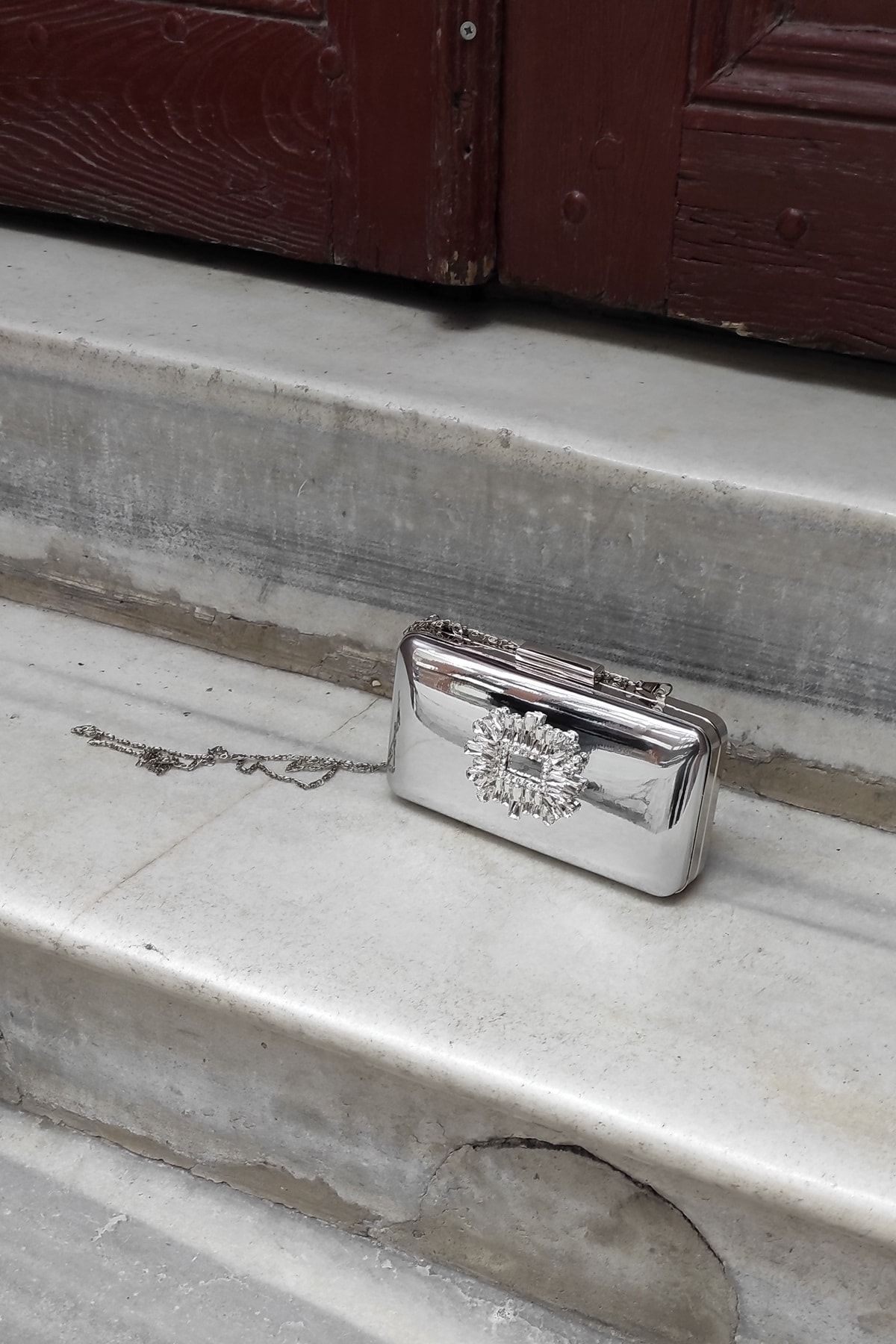 Silver mirror hotsell clutch bag