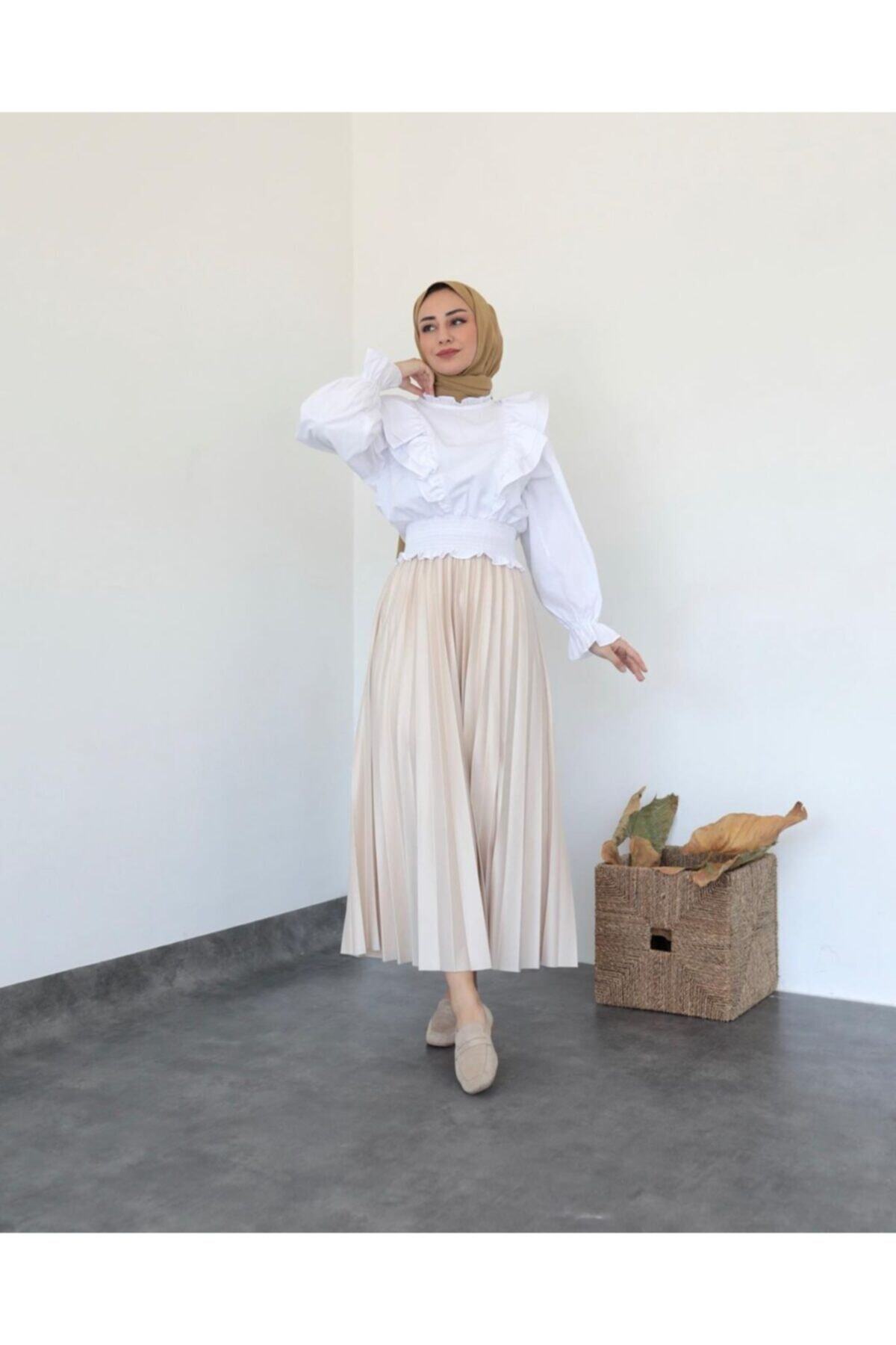 modayseli Deri Görünümlü Pileli Içi Astarlı Etek