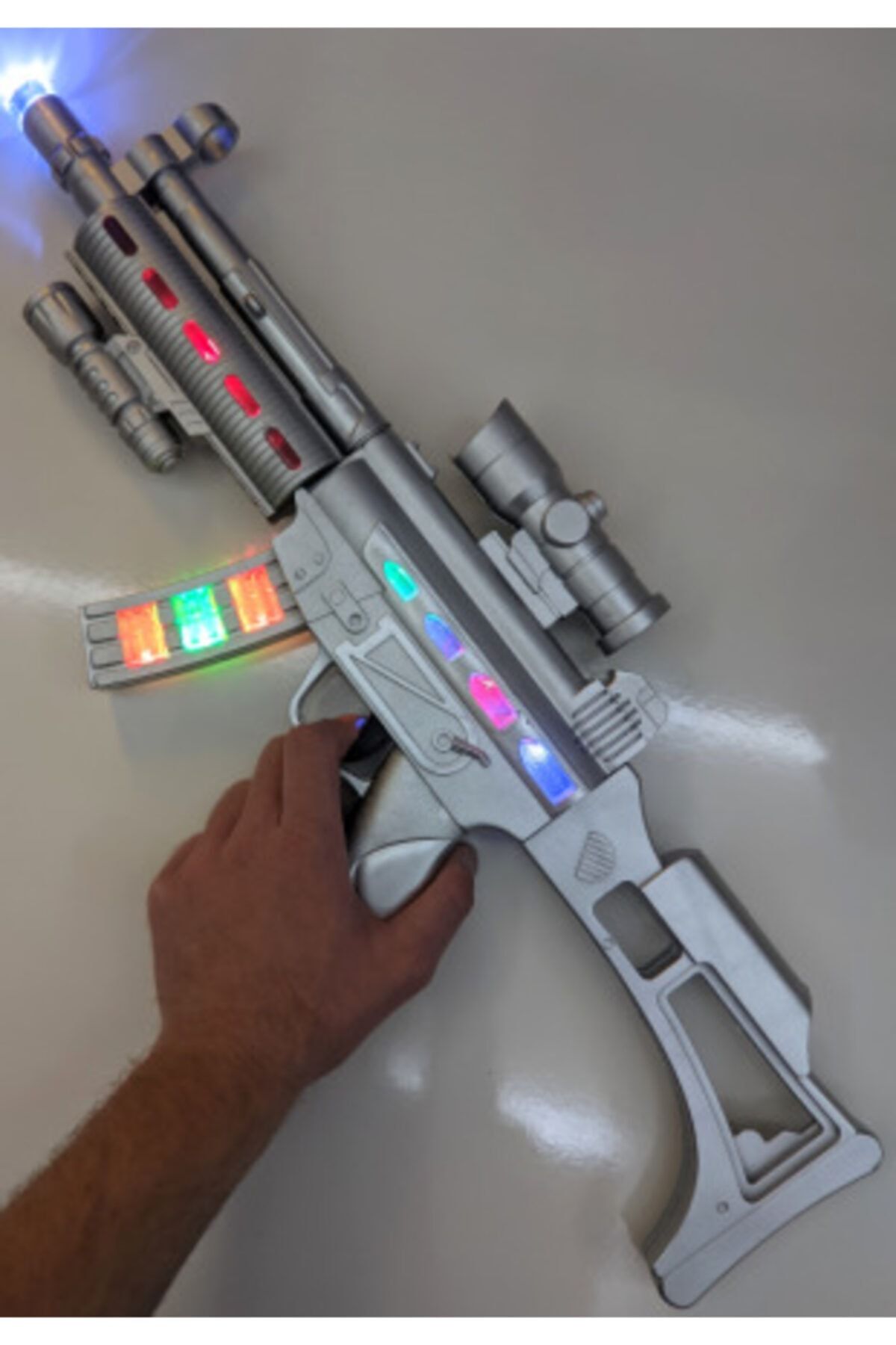 SLV Pilli  Işıklı ve Sesli Gümüş Taramalı Otomatik Saldırı Tüfeği 58 cm