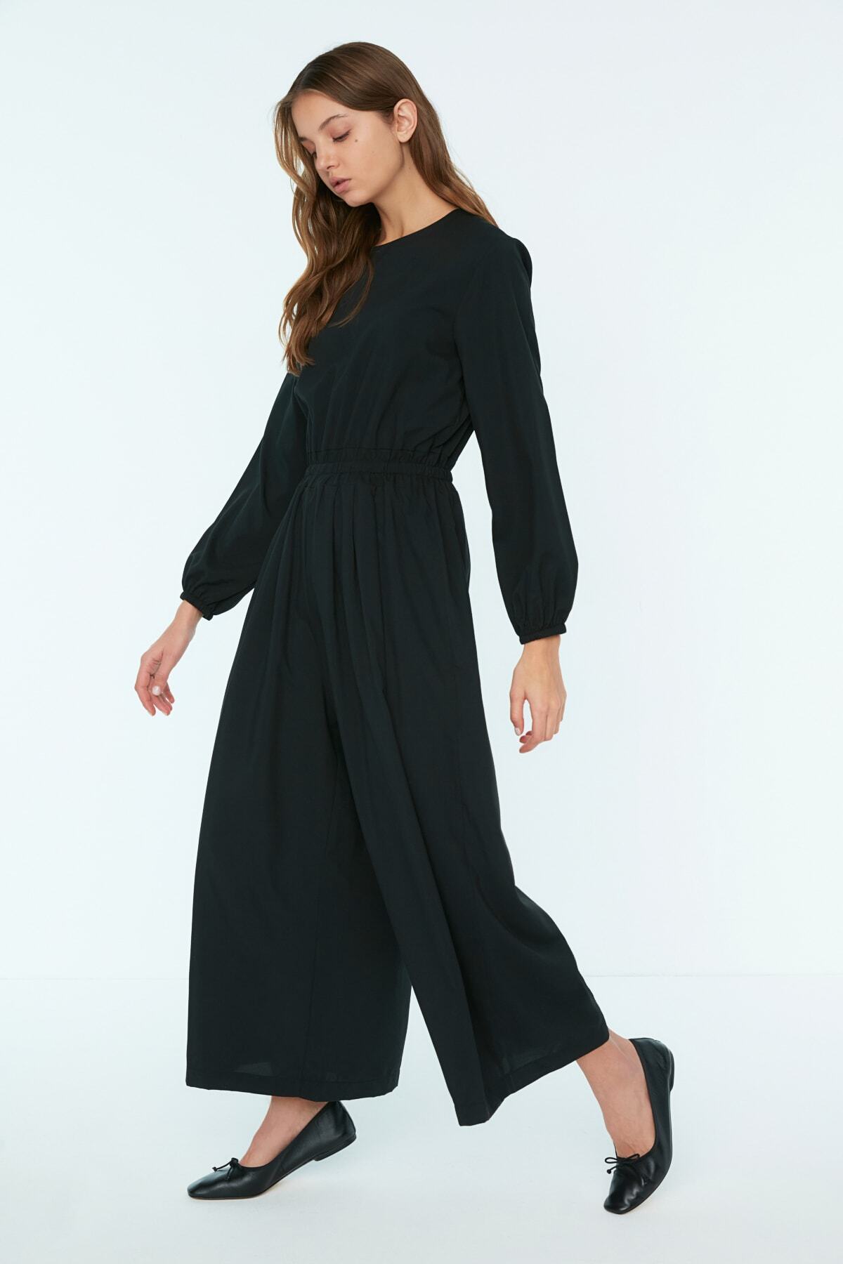 Trendyol Modest Siyah Bisiklet Yaka Beli Lastikli Geniş Paça Tulum TCTSS22TL0003