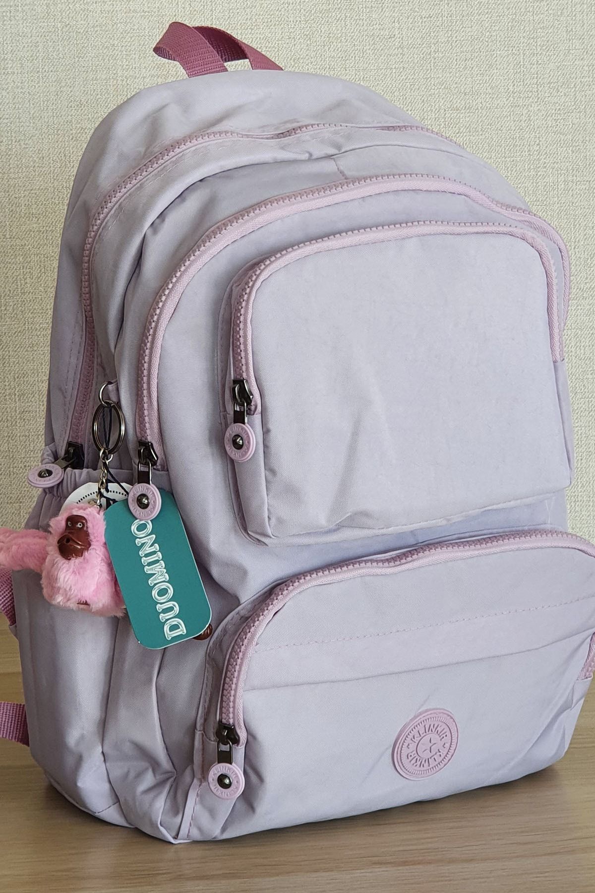 DUOMİNO Lila Sırt Çantası Suya Dayanıklı Krinkıl Laptop Seyahat Okul Çantası 18lt 40x30x15cm Nemobags