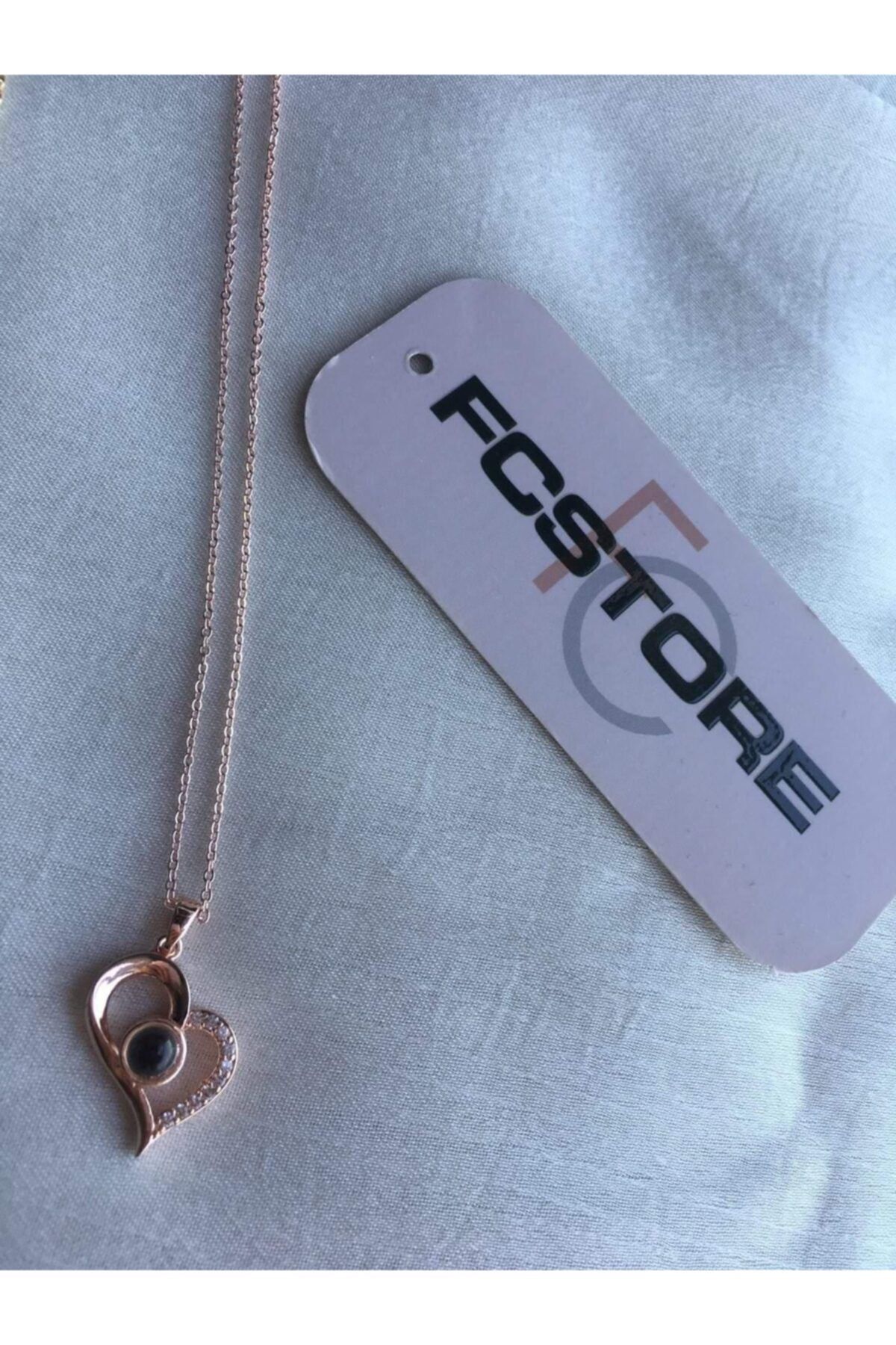 FCSTORE 100 Dilde Seni Seviyorum Yazılı Büyütece Sahip Rose Rengi Kalpli Kolye