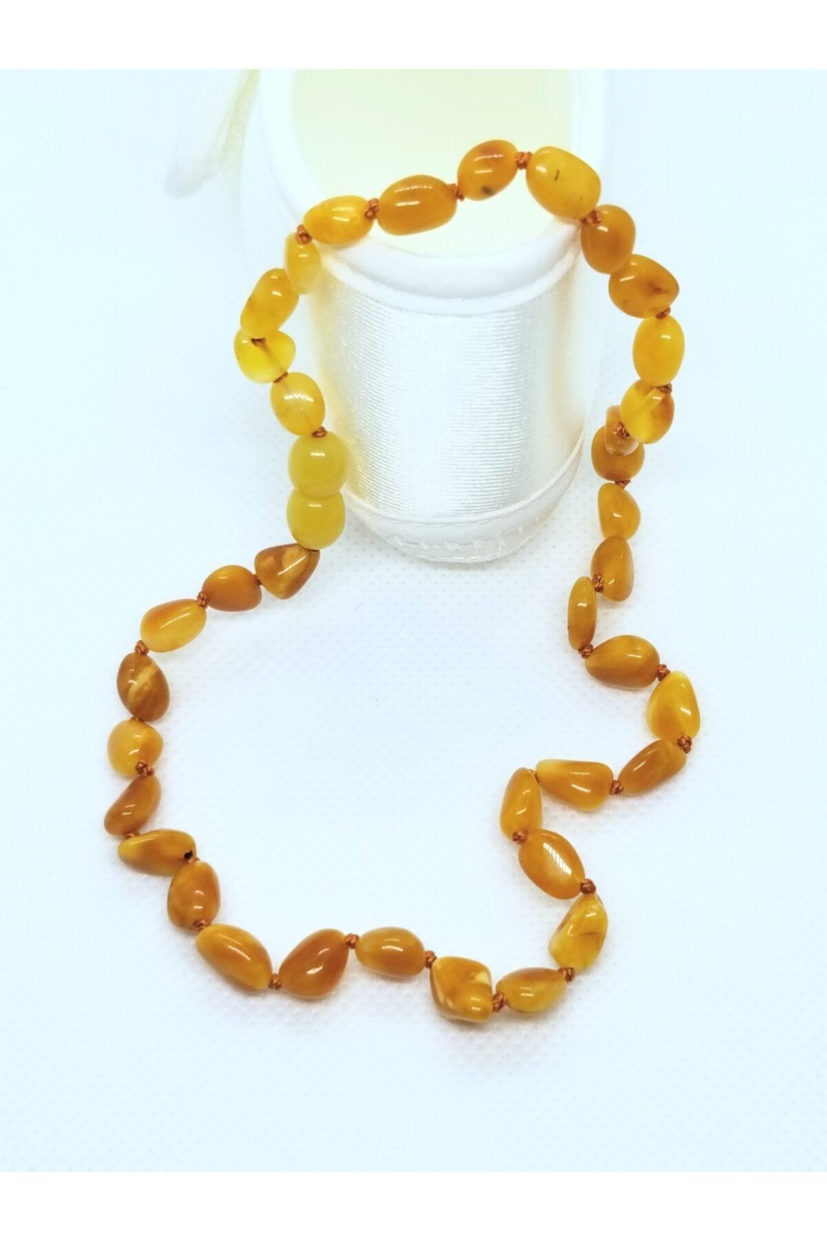 ipek gumus kehribar bebek dis kolyesi damla kehribar natural amber sifali tas fiyati yorumlari trendyol