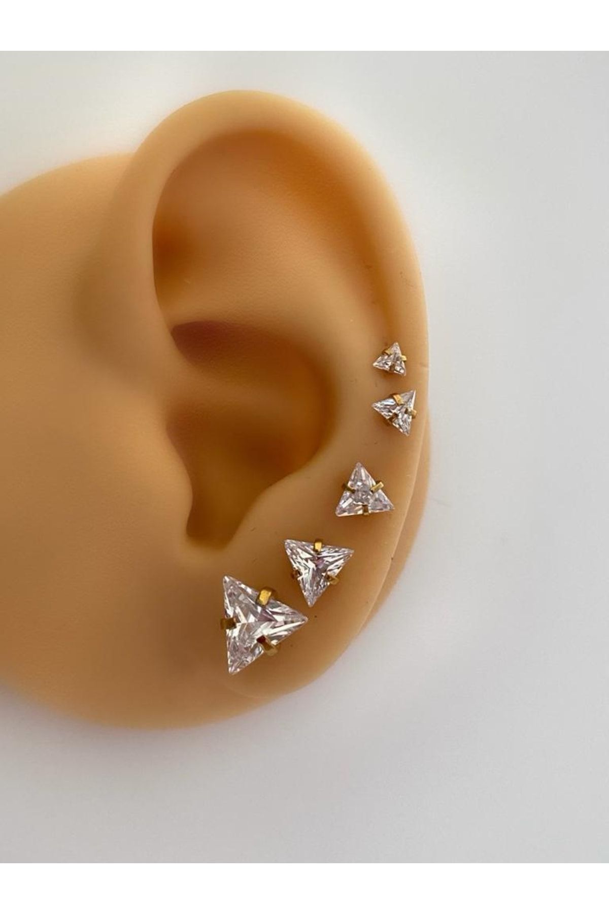 Triangle piercing jewelry discount