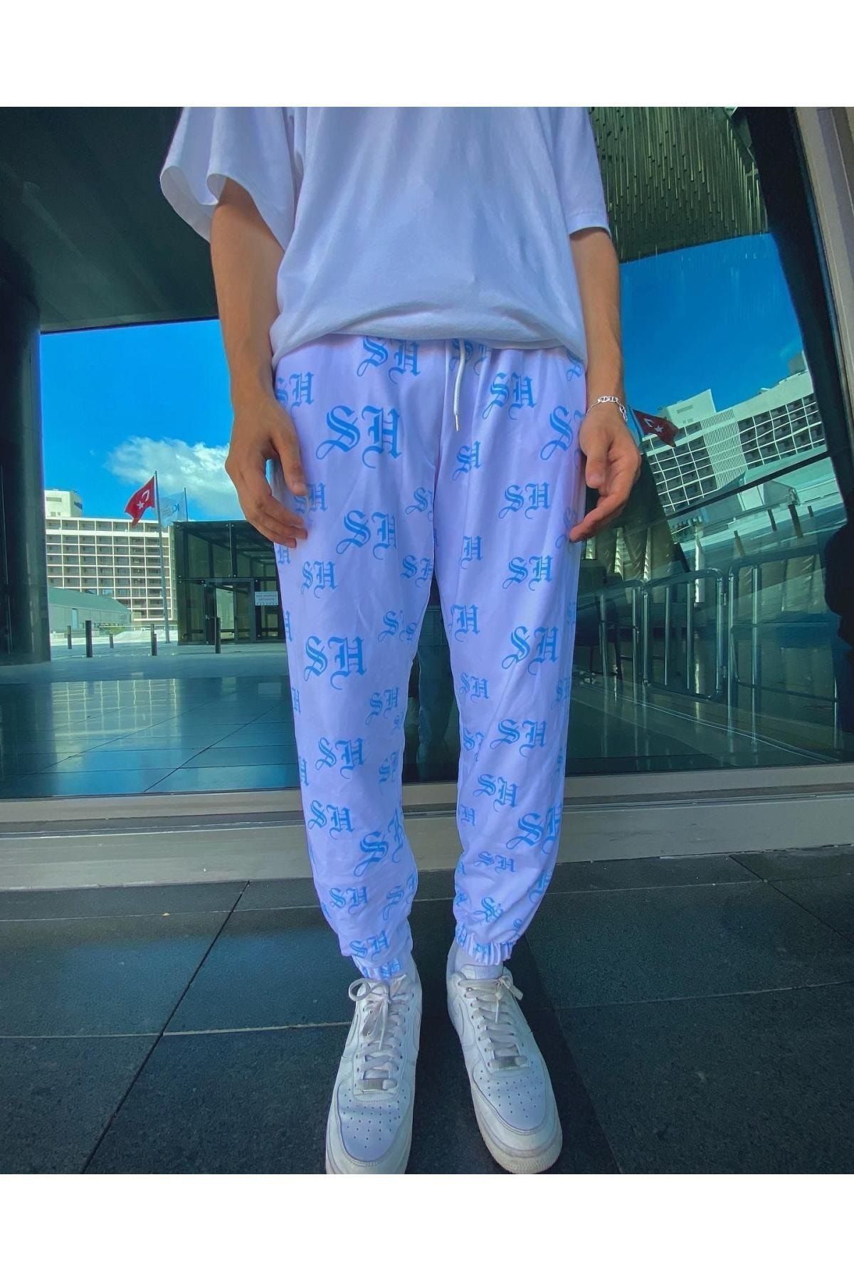 Blue sweatpants with online pink flames