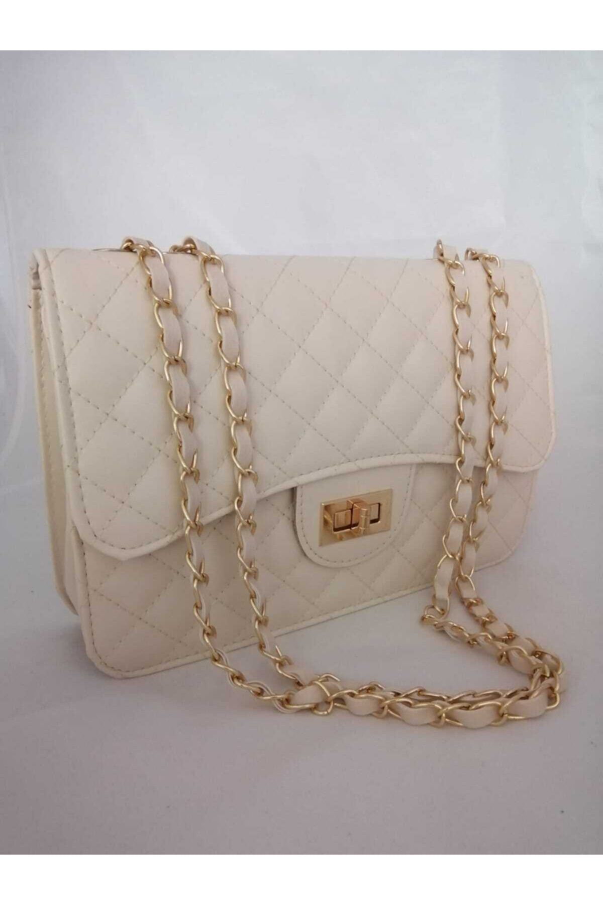 butik kadin bej gold zincirli sik kullanisli kol cantasi fiyati yorumlari trendyol