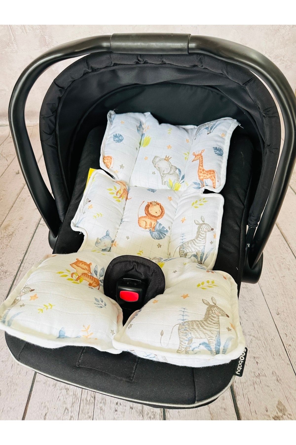 Car seat outlet carrier cushion