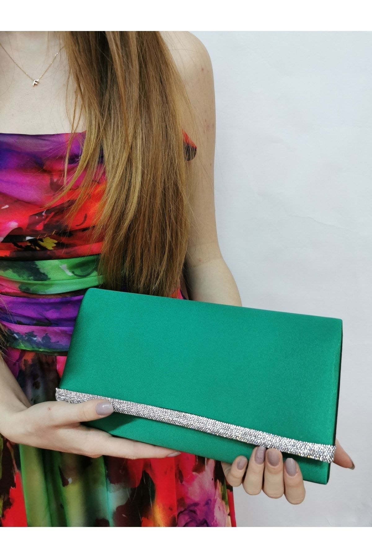 Navy and green online clutch bag