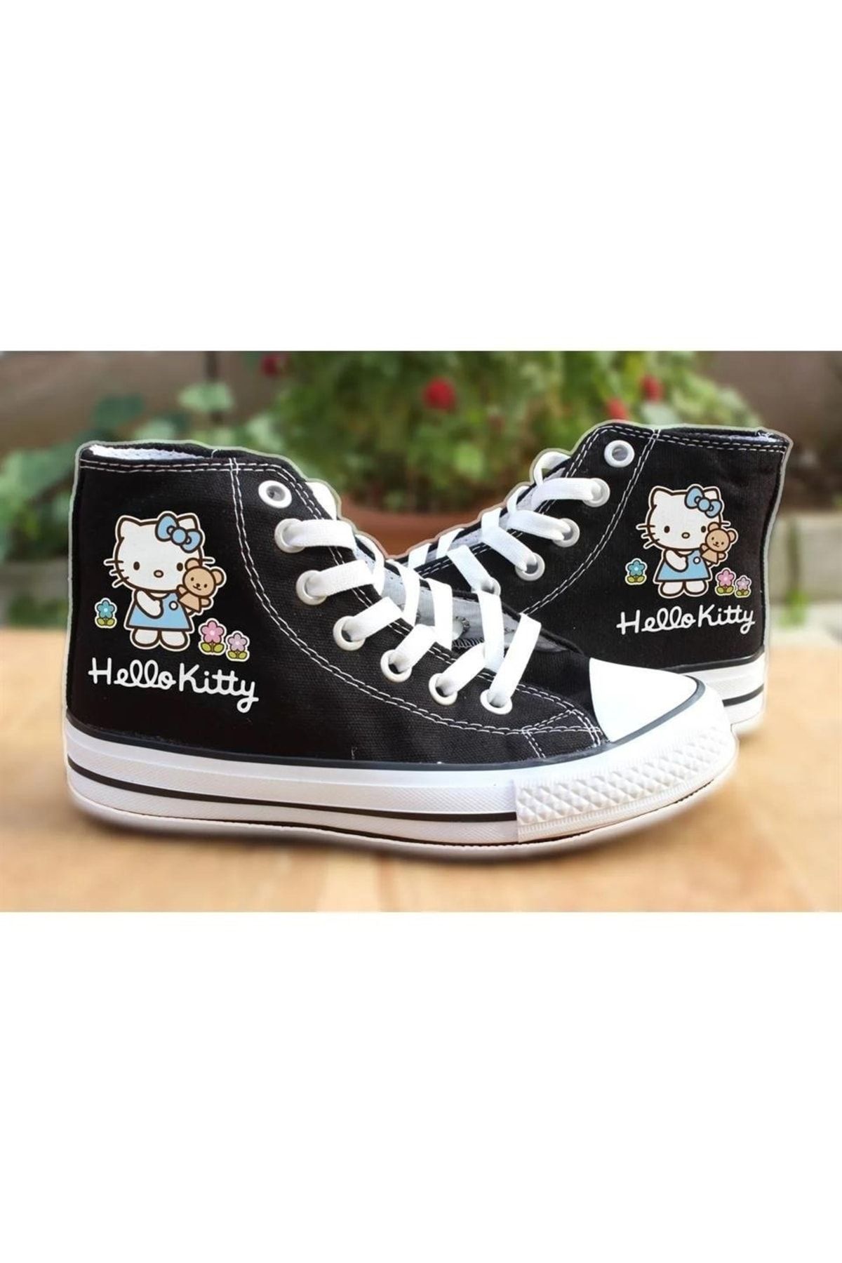 Black hello sale kitty converse