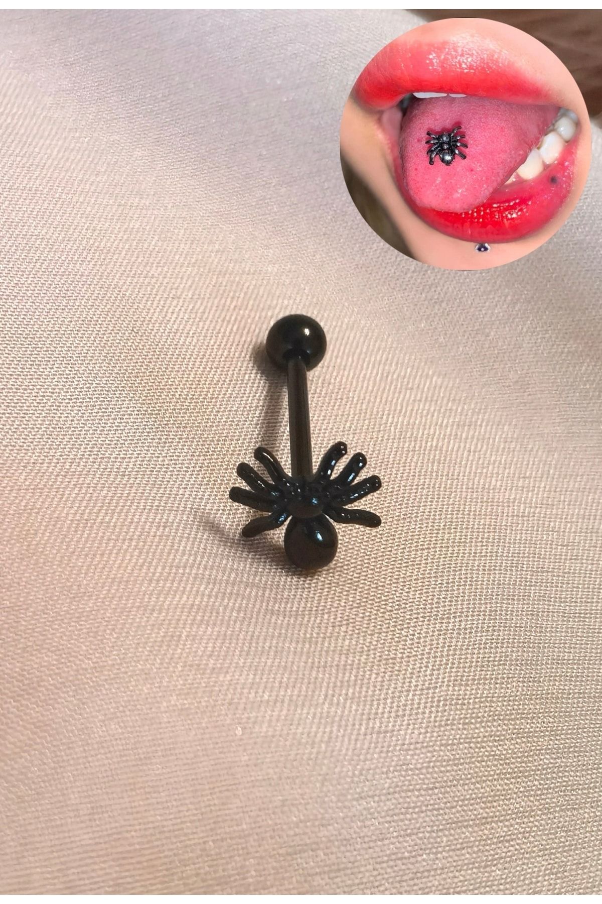 Spider outlet tongue piercing