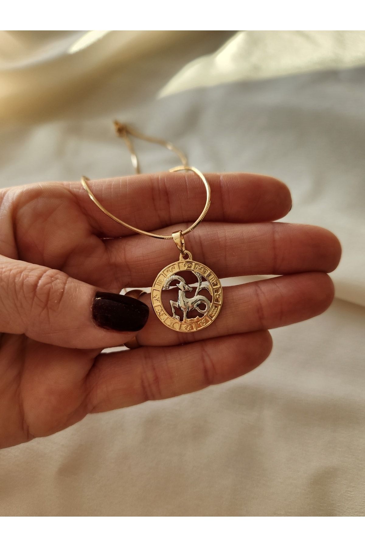 Rose gold capricorn necklace on sale