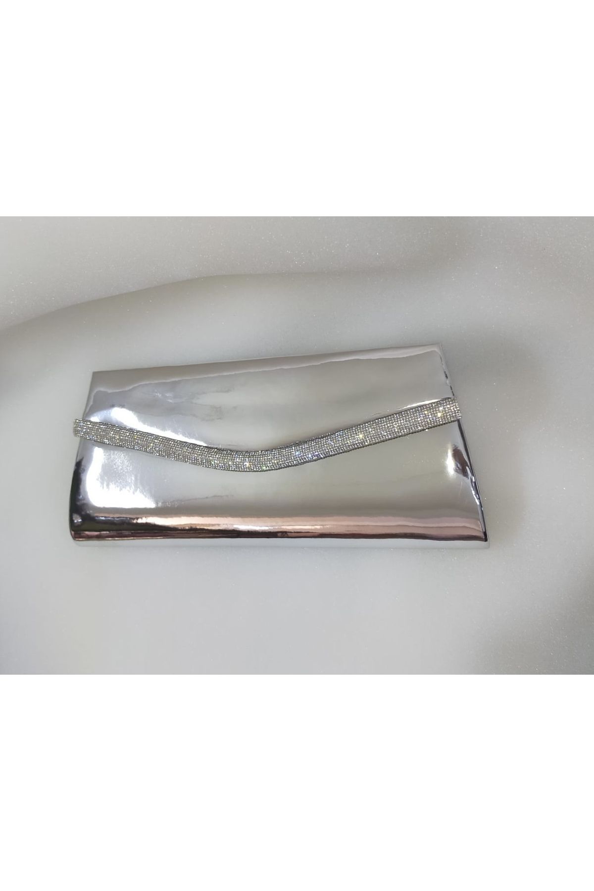 Silver patent clutch store bag