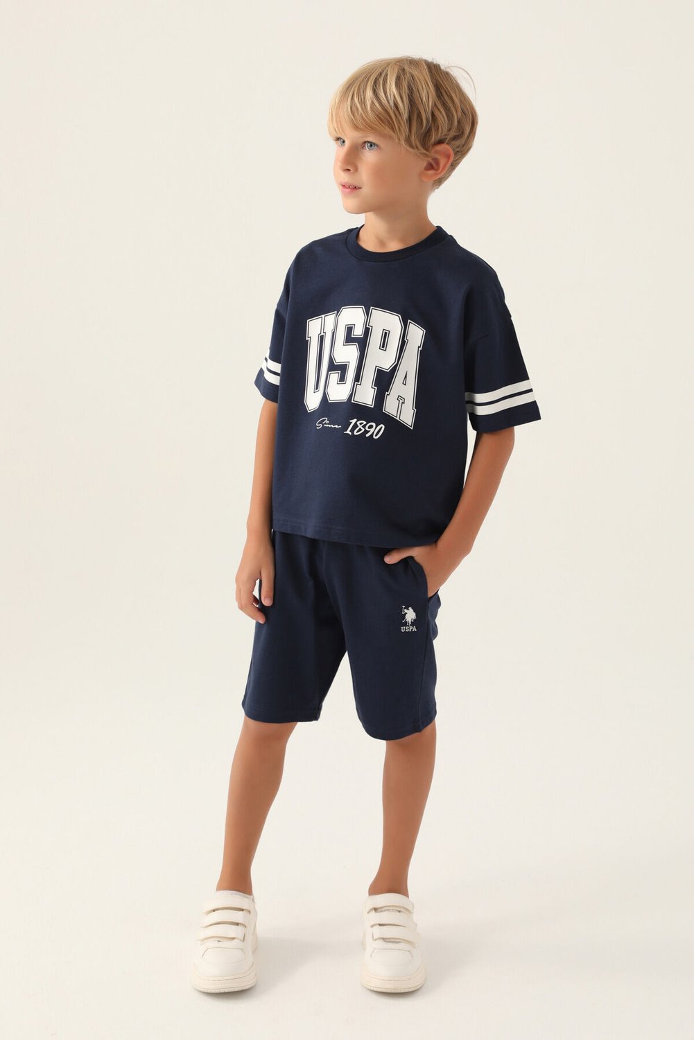 بدلة برمودا للأولاد باللون البرتقالي اللامع مرخصة من US Polo Assn