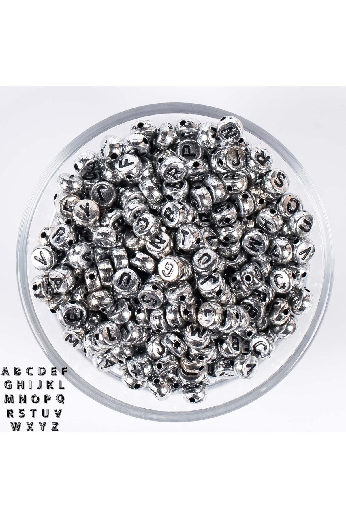 25 Gram- 7 Mm Yassı Harf Boncuk, Metalik Gümüş Üzeri Siyah Harf Boncuk 1.kalite- 25 Gr- 175-180 Adet