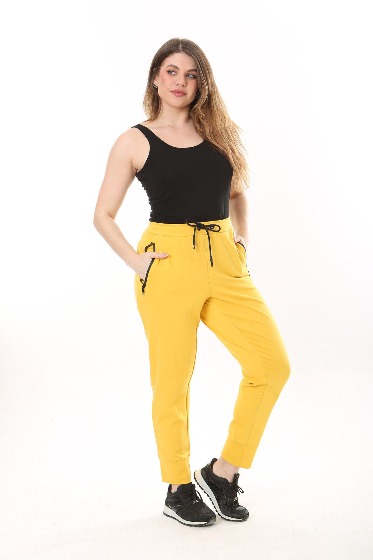 Şans Kadın Büyük Beden Sarı Kuşgözü Bağcık Ve Lastikli Fermuarlı Cep Detaylı Spor Pantolon 65N37567