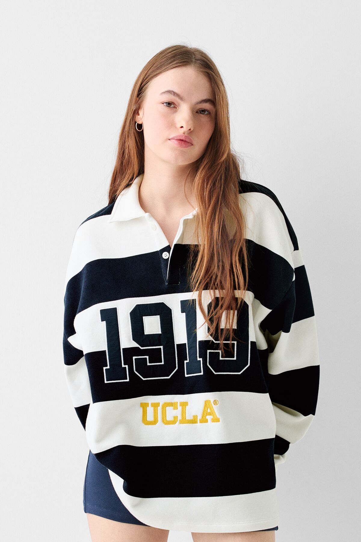 Bershka Polo yaka işlemeli UCLA sweatshirt