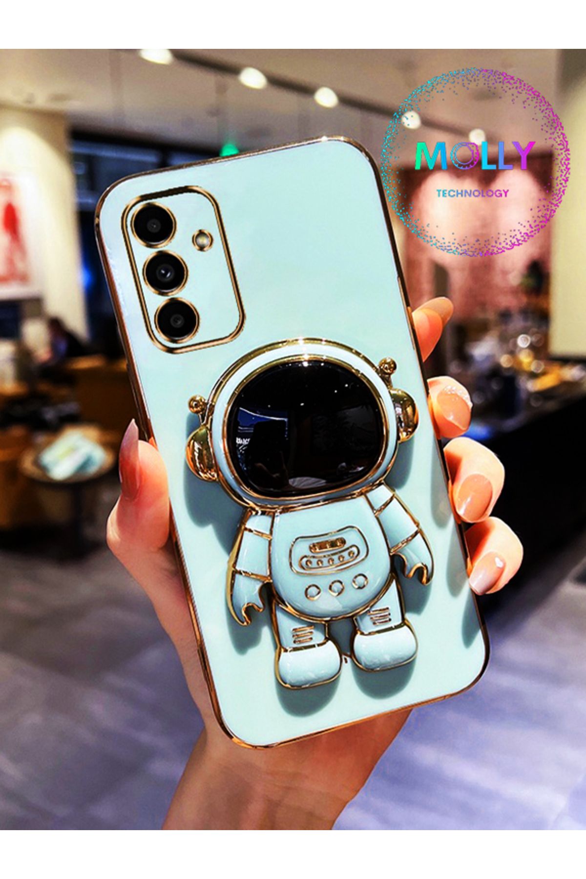 Molly Samsung Galaxy M13 İçin Su Yeşili Astronot Standlı Kenarları Gold Detaylı Lüks Silikon Kılıf