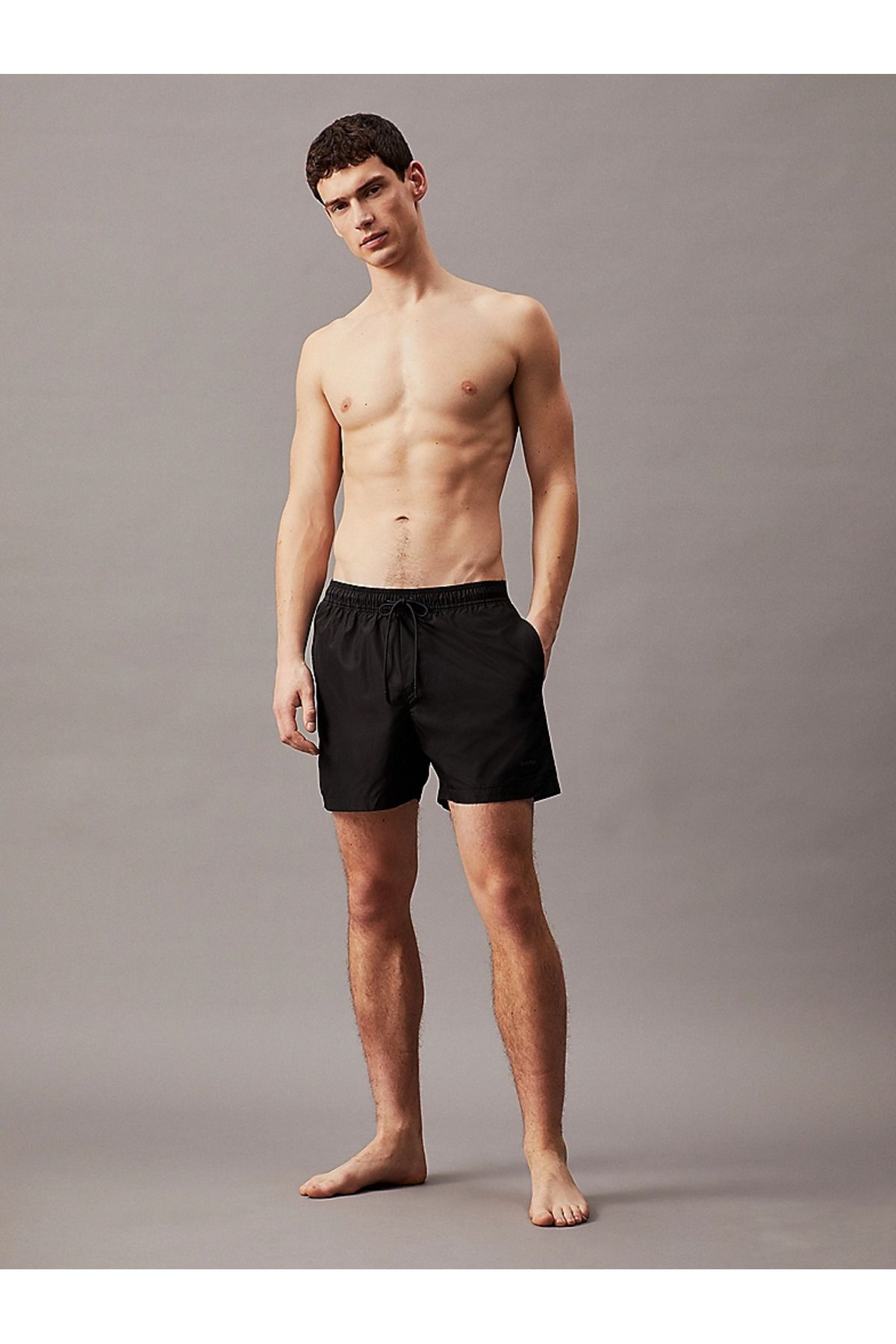 Calvin Klein Erkek Çabuk Kuruyan Kumaşlı Normal Kesim Siyah Deniz Şortu KM0KM00945-BEH