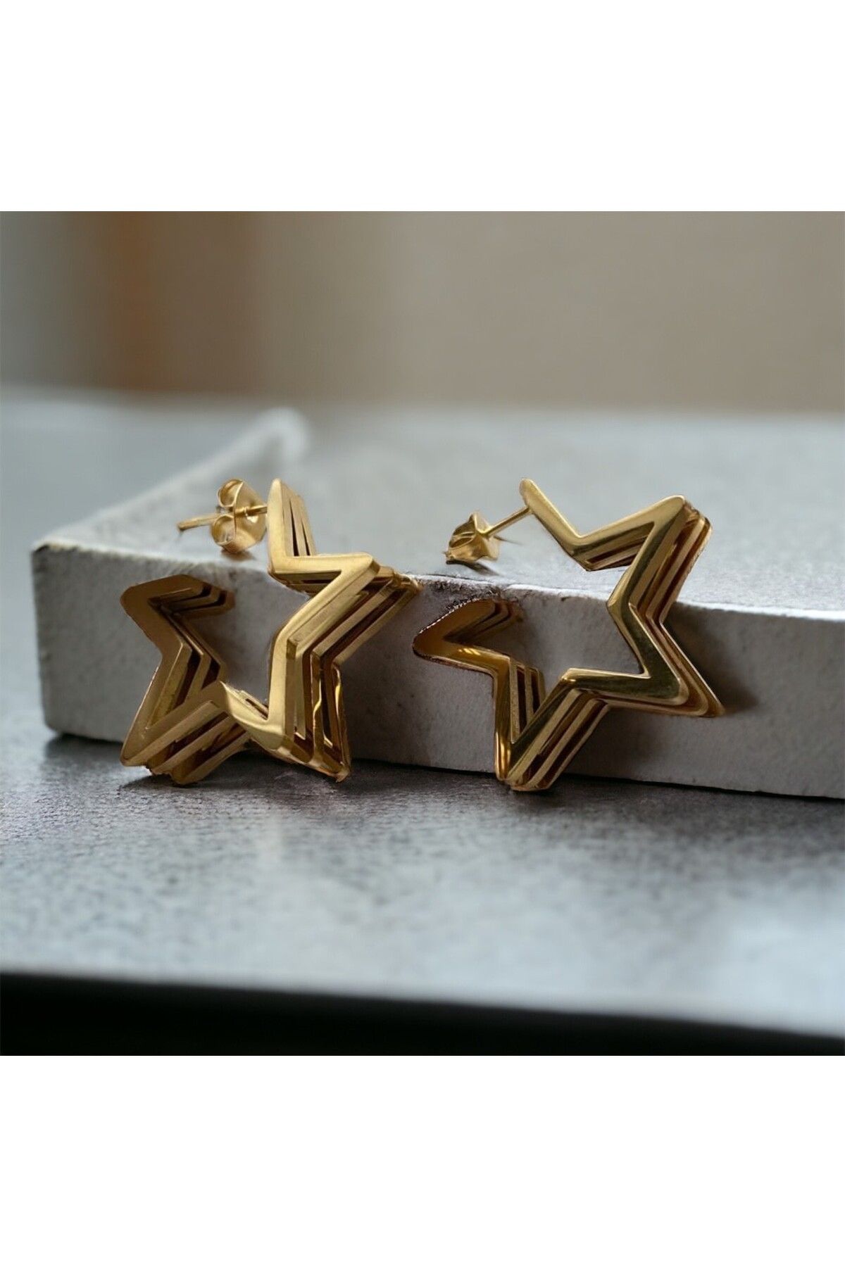 stainless steell 3 boyutlu gold yıldız küpe
