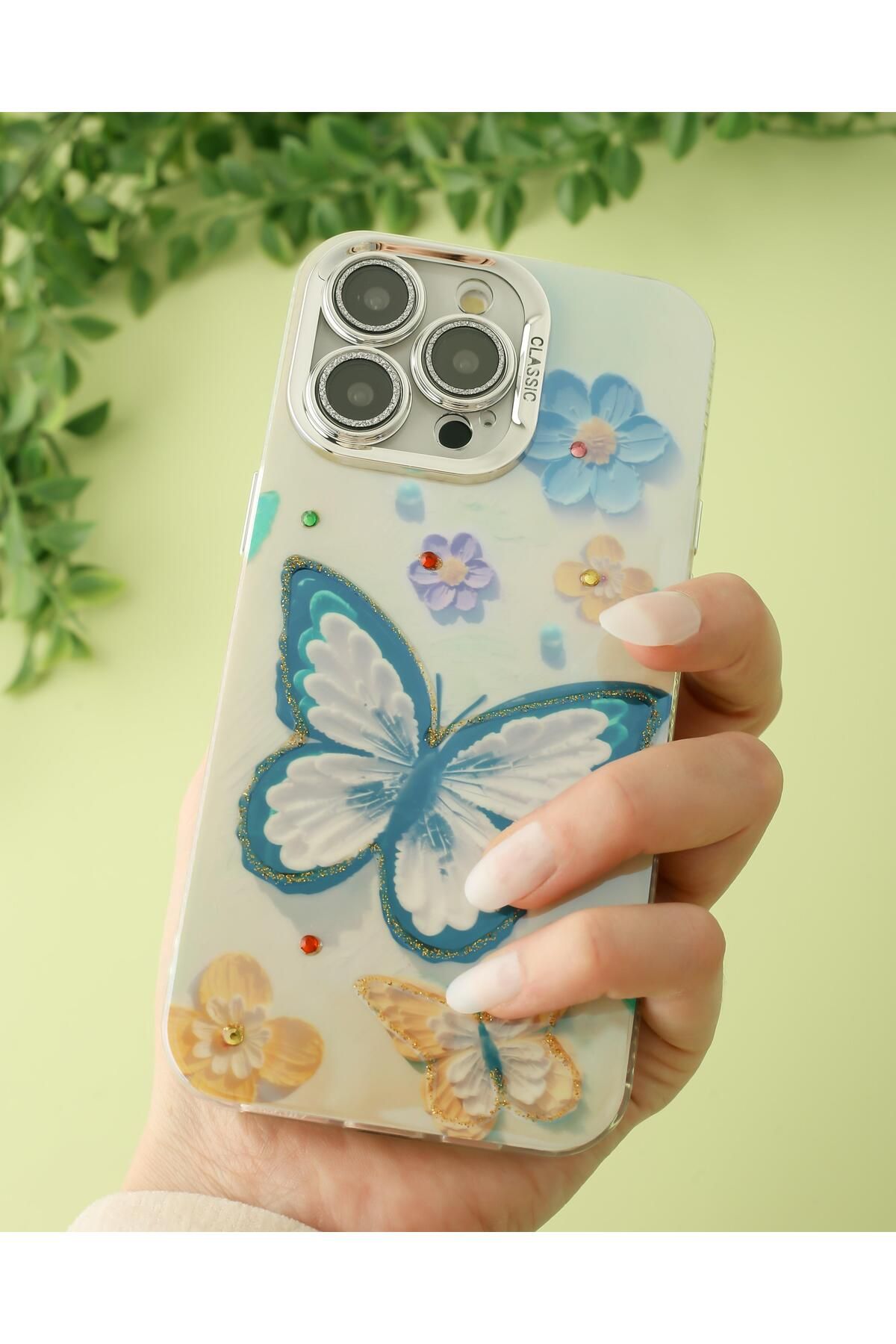 Paladyum Case iPhone 14 Promax Uyumlu Lens Korumalı Simli Kelebekli Çiçekli Kılıf
