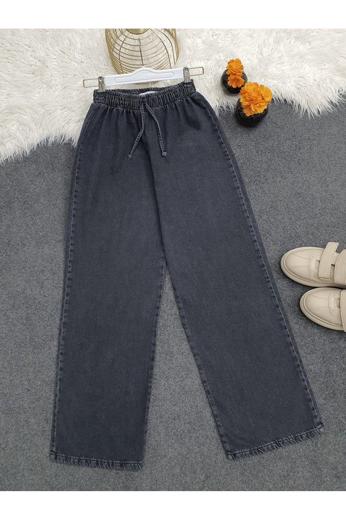 Modamorfo Bol Paça Beli Lastikli Bağcık Detaylı Kot Pantolon