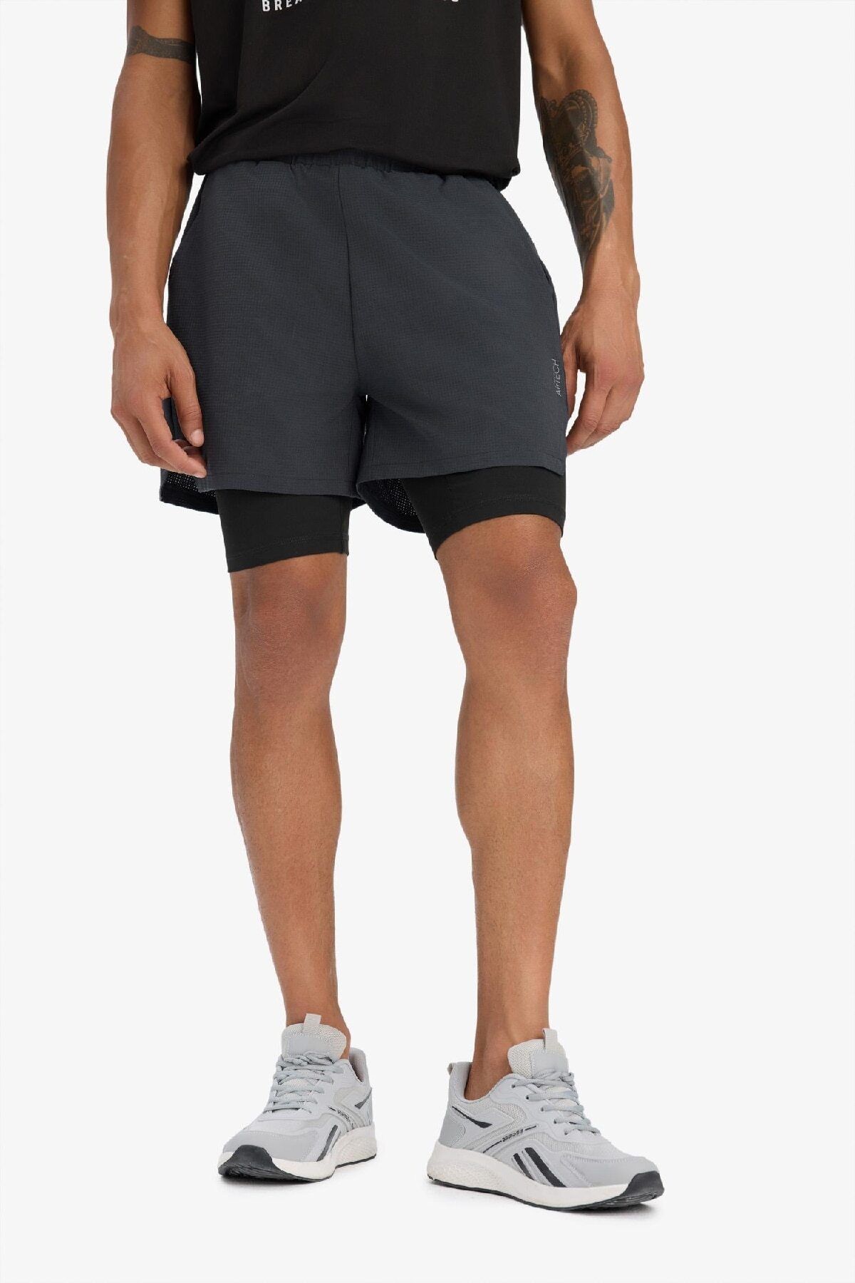 Defacto DeFactoFit Slim Fit Dar Kesim Sporcu Taytlı Dokuma Şort D7809AX25SP