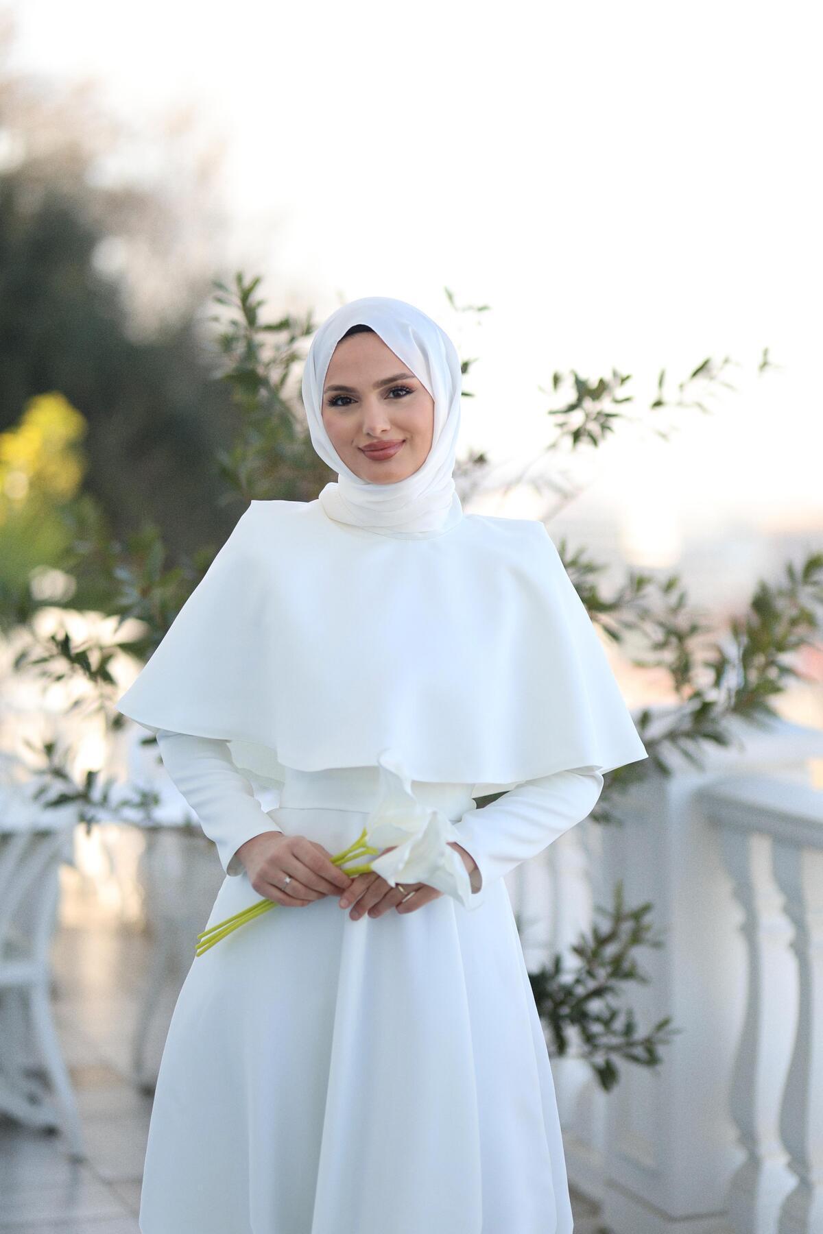 DİSE Kadın Beyaz Pelerin Detaylı Pelerinli Belle Tesettür Abiye | ₺1539