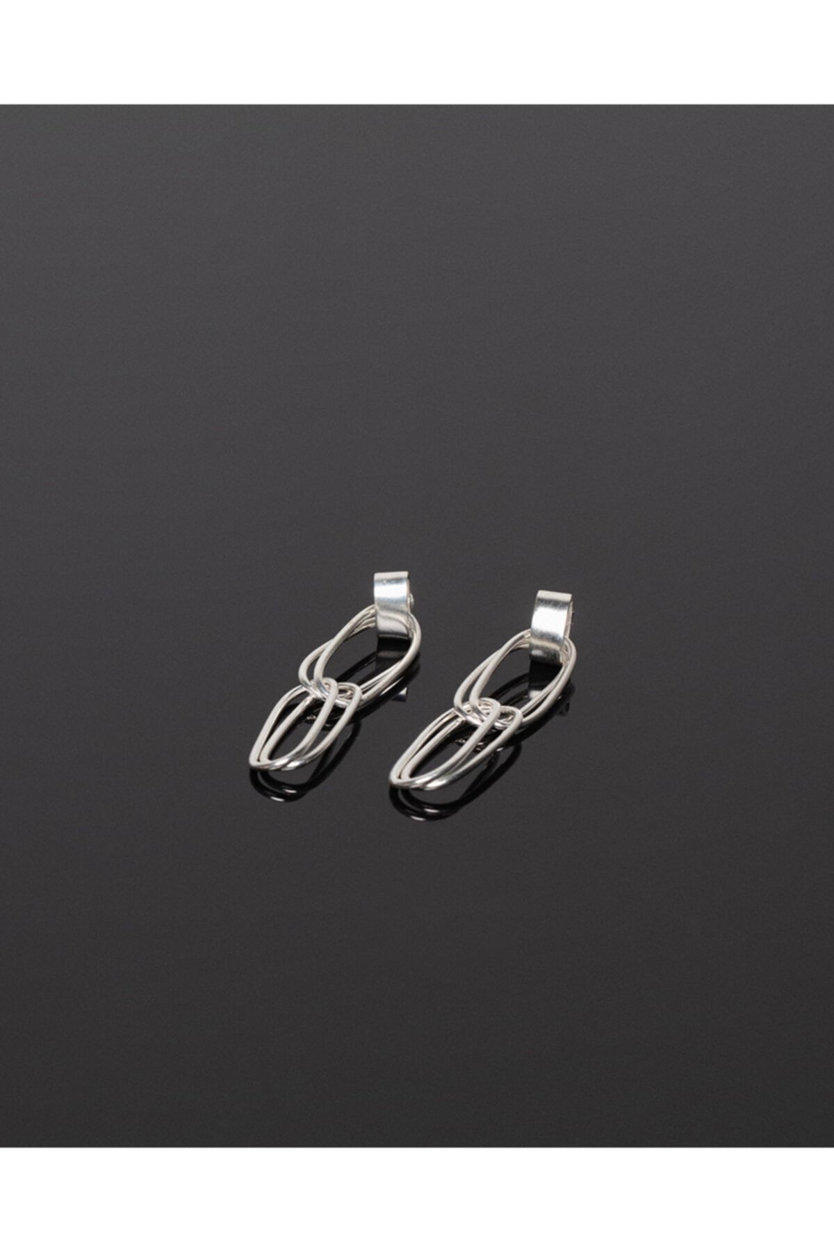 Studio Agna Twist Earrings In Silver