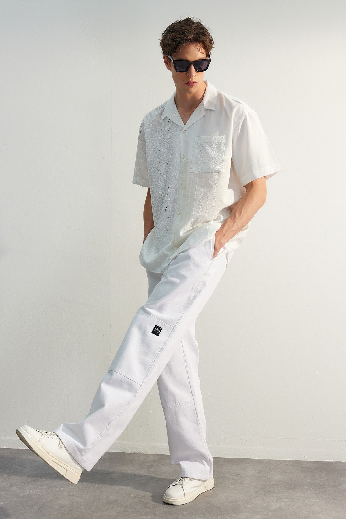 TRENDYOL MAN Limited Edition Beyaz Premium Loose Fit Pantolon TMNSS23PL00038