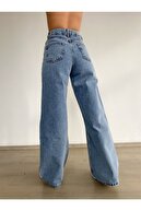 کارامل لباسشویی آبی برف زنانه سوپر فاق بلند جین ساق گشاد لیکرا-thumb