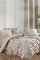 with patterned beige sheets