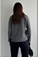 یقhe گرد زنان ژاکت کش بافش آنتراسیت را بالا برد-thumb