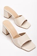 TEN PATENT LEATHER