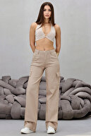 شلوار دمپا گشاد لیکرا جیبی باری بژ-thumb