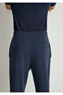 شلوار گرمکن آبی سرمه ای چاپ شده با لوگو Mvjns 0010175-70490-thumb