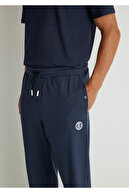 شلوار گرمکن آبی سرمه ای چاپ شده با لوگو Mvjns 0010175-70490-thumb