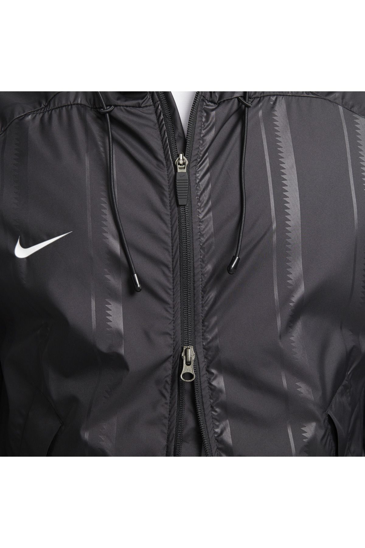 White and black top nike rain jacket