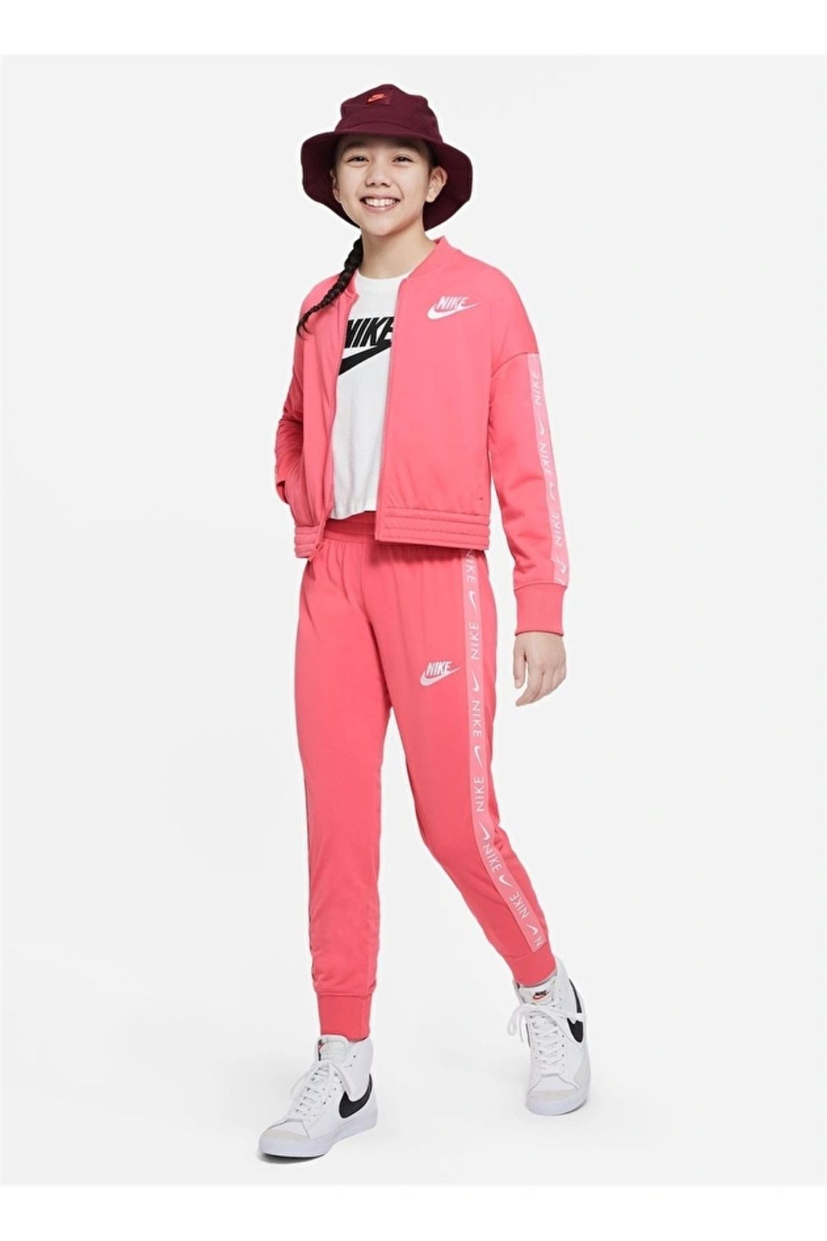 Pink sweatsuit nike hot sale