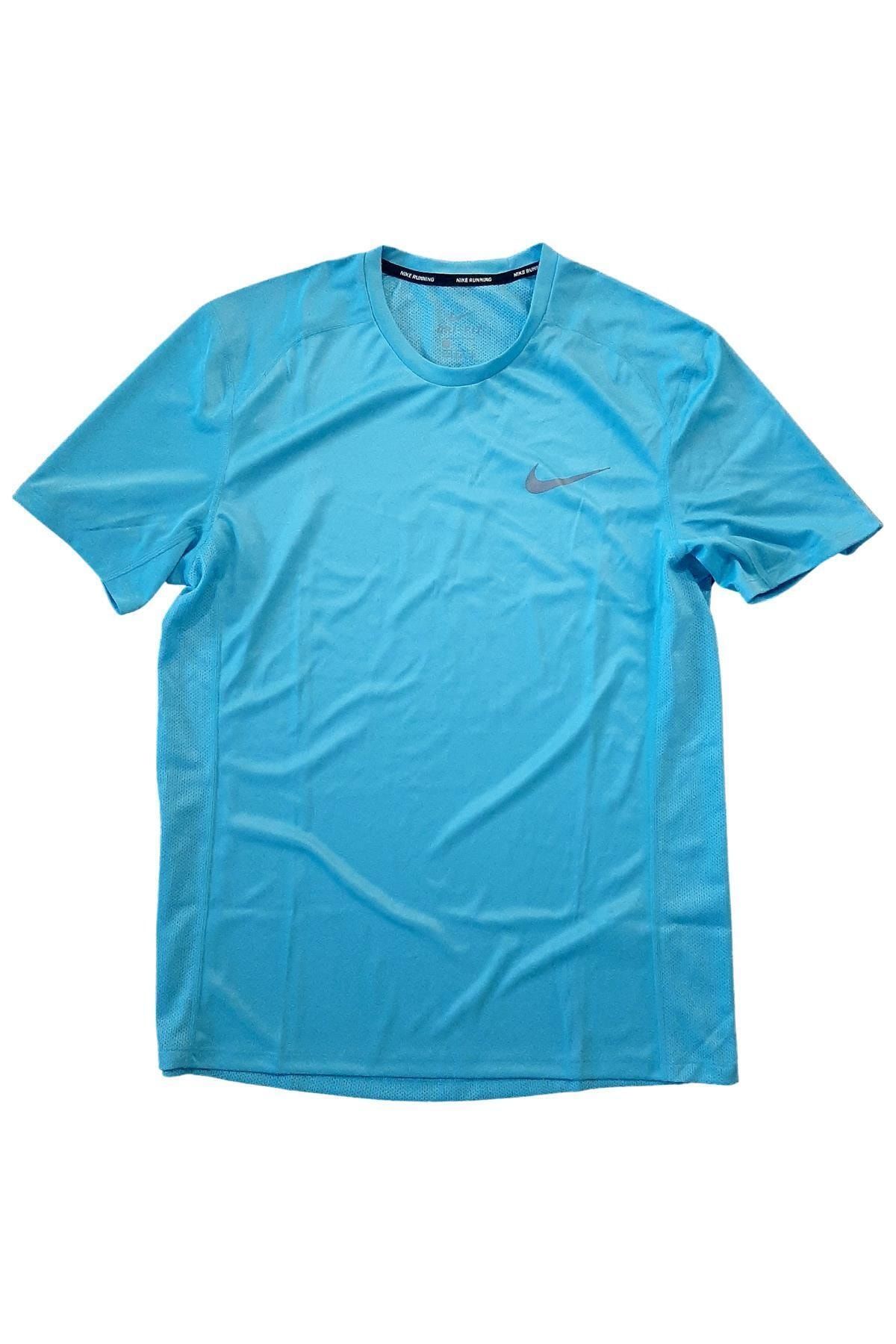 Teal and pink nike shirt top