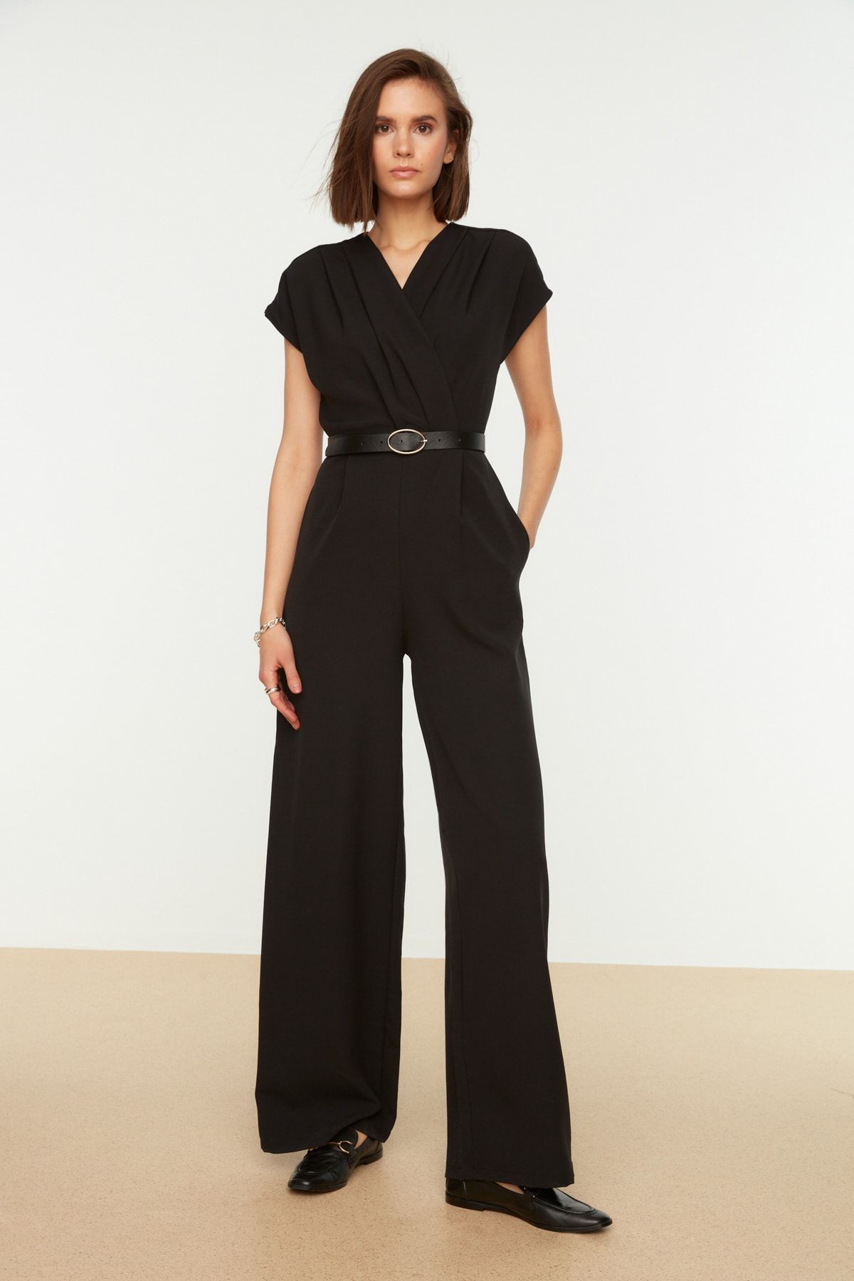 Black jumpsuit with shop buttons